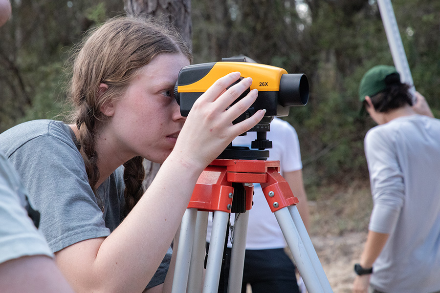 Student using scientific equipment